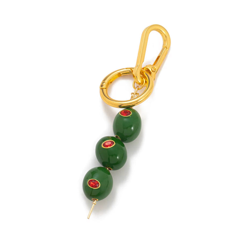 Gold plated olive martini bag charm keychain with three green enamel olives and red crystal pimento details on a carabiner clip