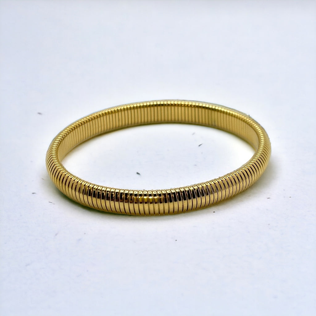 A gold-plated stainless steel snake bracelet on a white background.