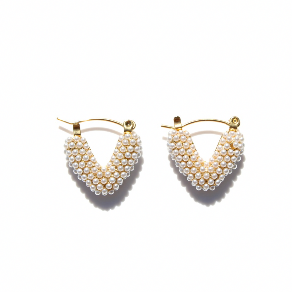 Pair of pearl earrings on a white background