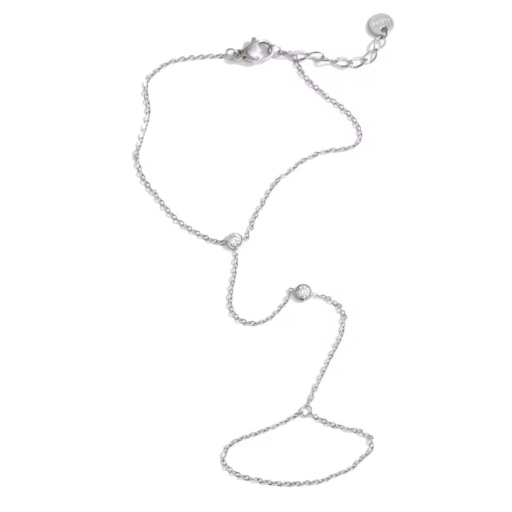 Silver hand chain bracelet on a white background