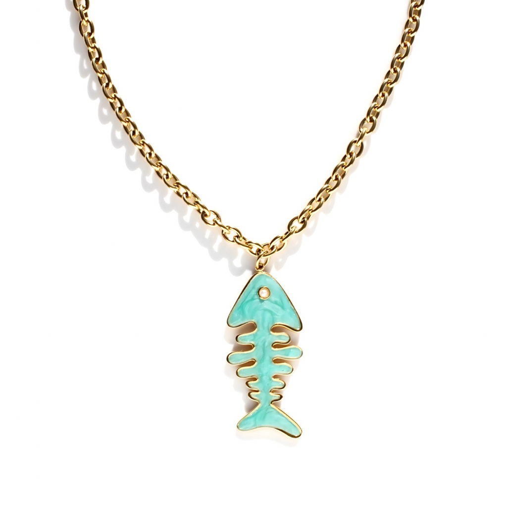 Gold necklace with a turquoise fish bone pendant on a white background