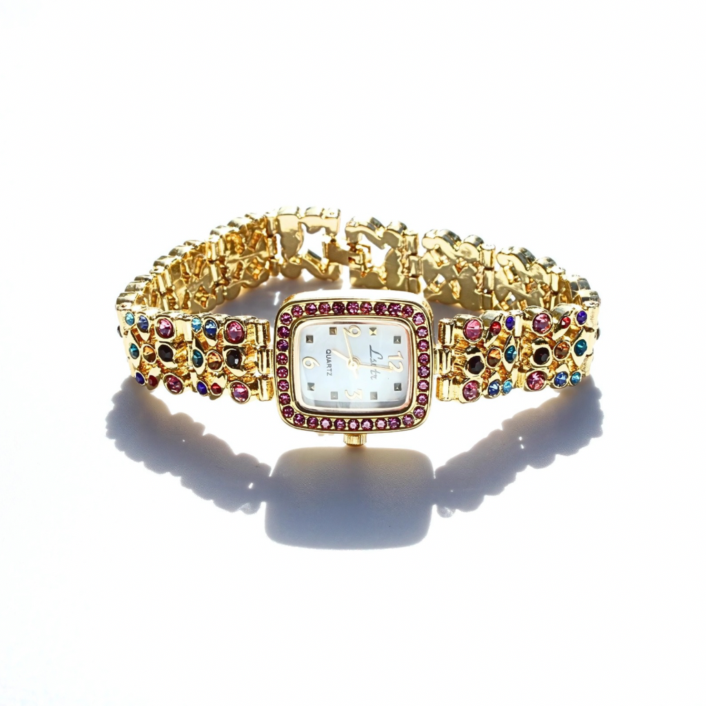 Gold watch with colorful gemstones on a white background