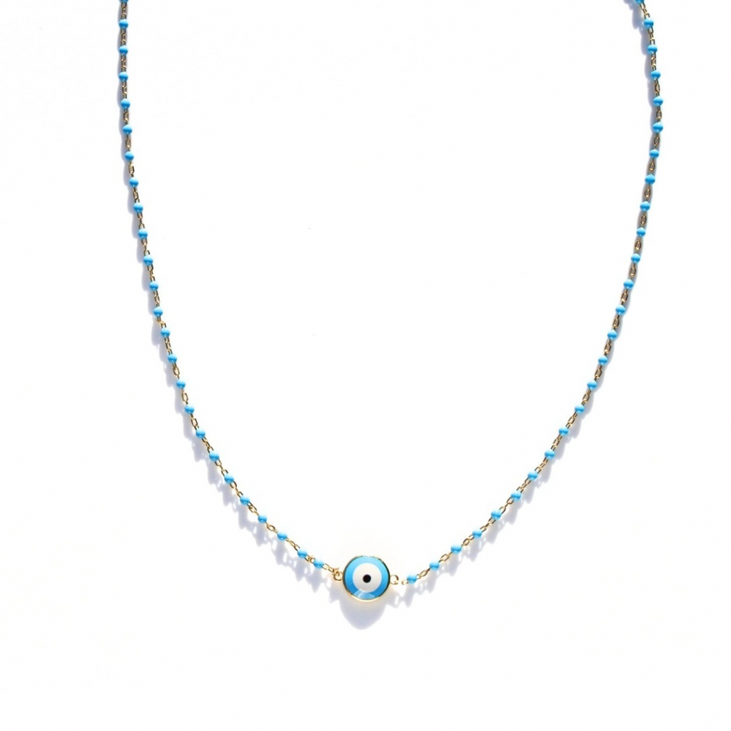 Necklace with a blue evil eye pendant on a white background