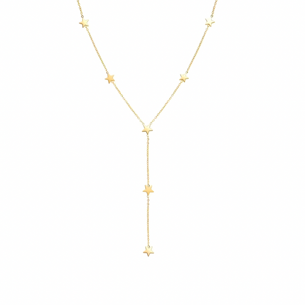 Gold star necklace on a white background